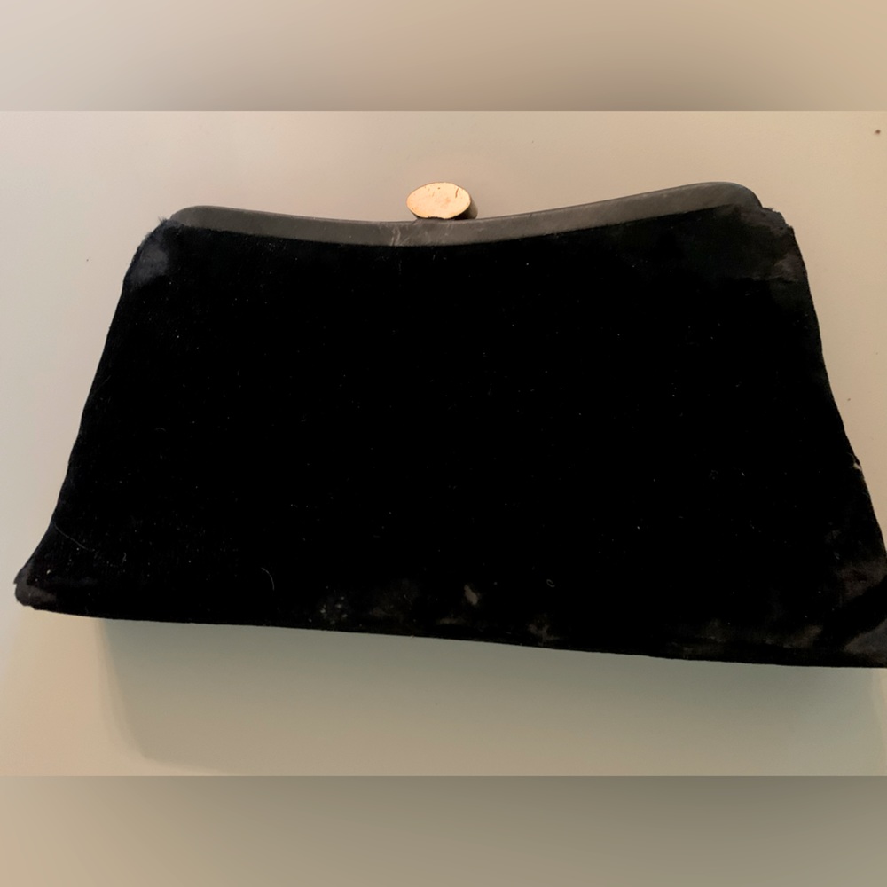 Woman’s vintage  black velvet clutch handbag.